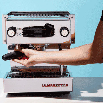 A shot is pulled in an espresso machine