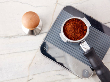 Espresso in a portafilter on a scale