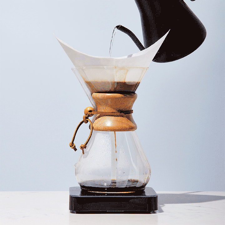 Water is poured over coffee grounds in a Chemex