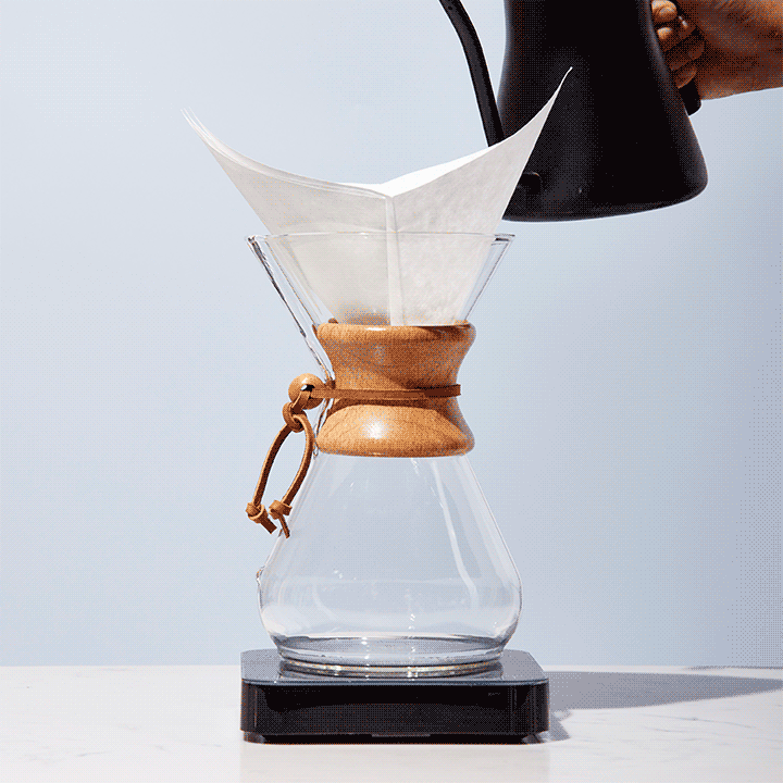Hot water is poured over a Chemex filter