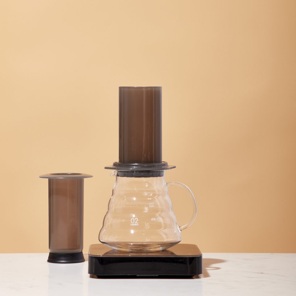 Aeropress sits atop a Hario range server and scale