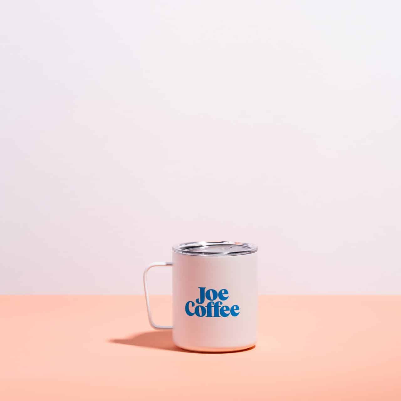 white mug, blue logo