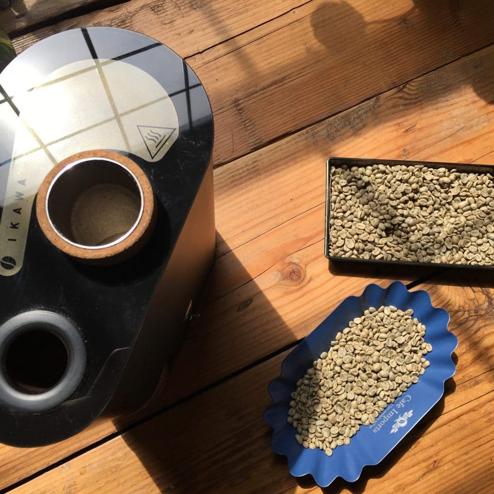 Ikawa roaster with green coffee beans