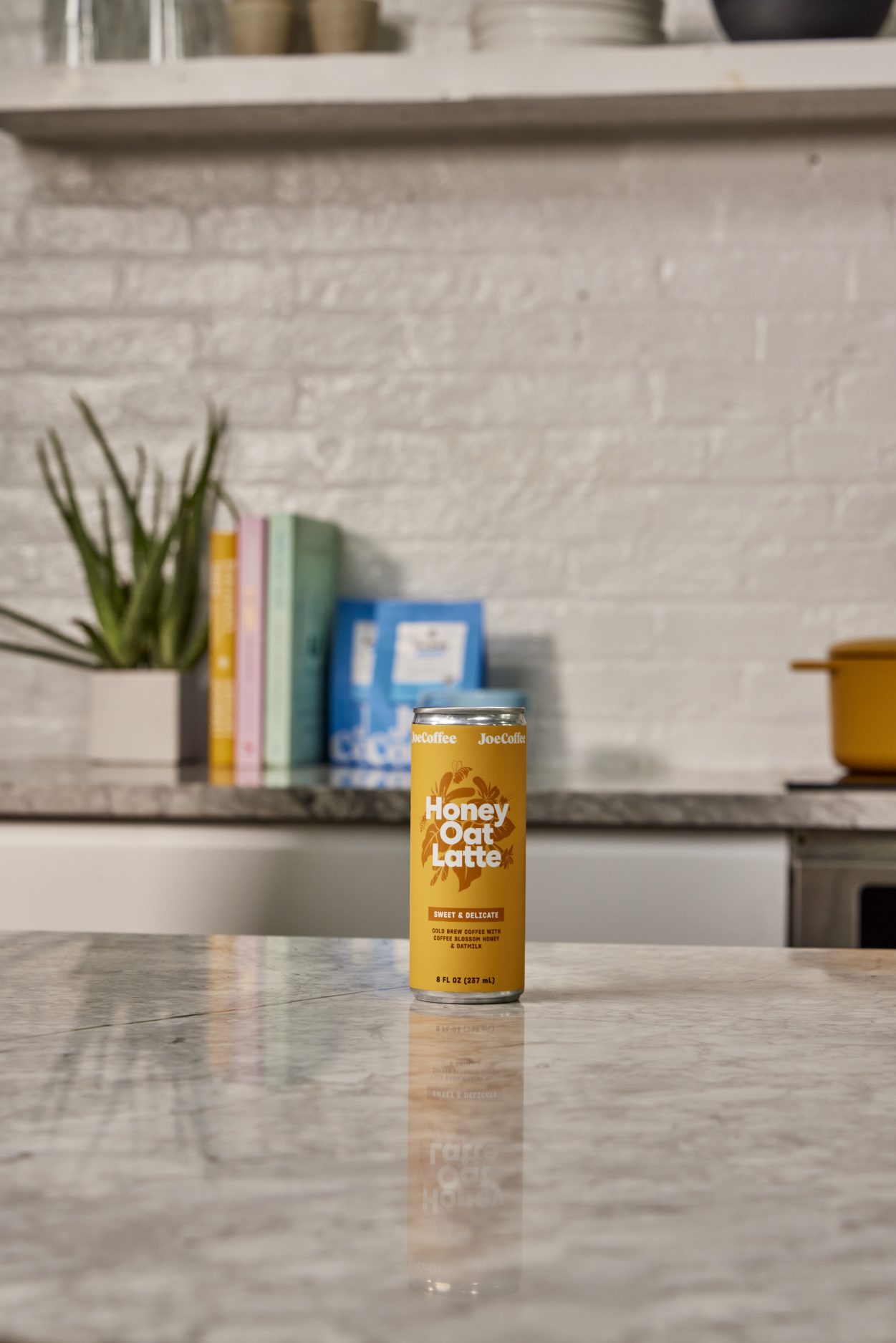 Honey Oat Latte can on a kitchen counter