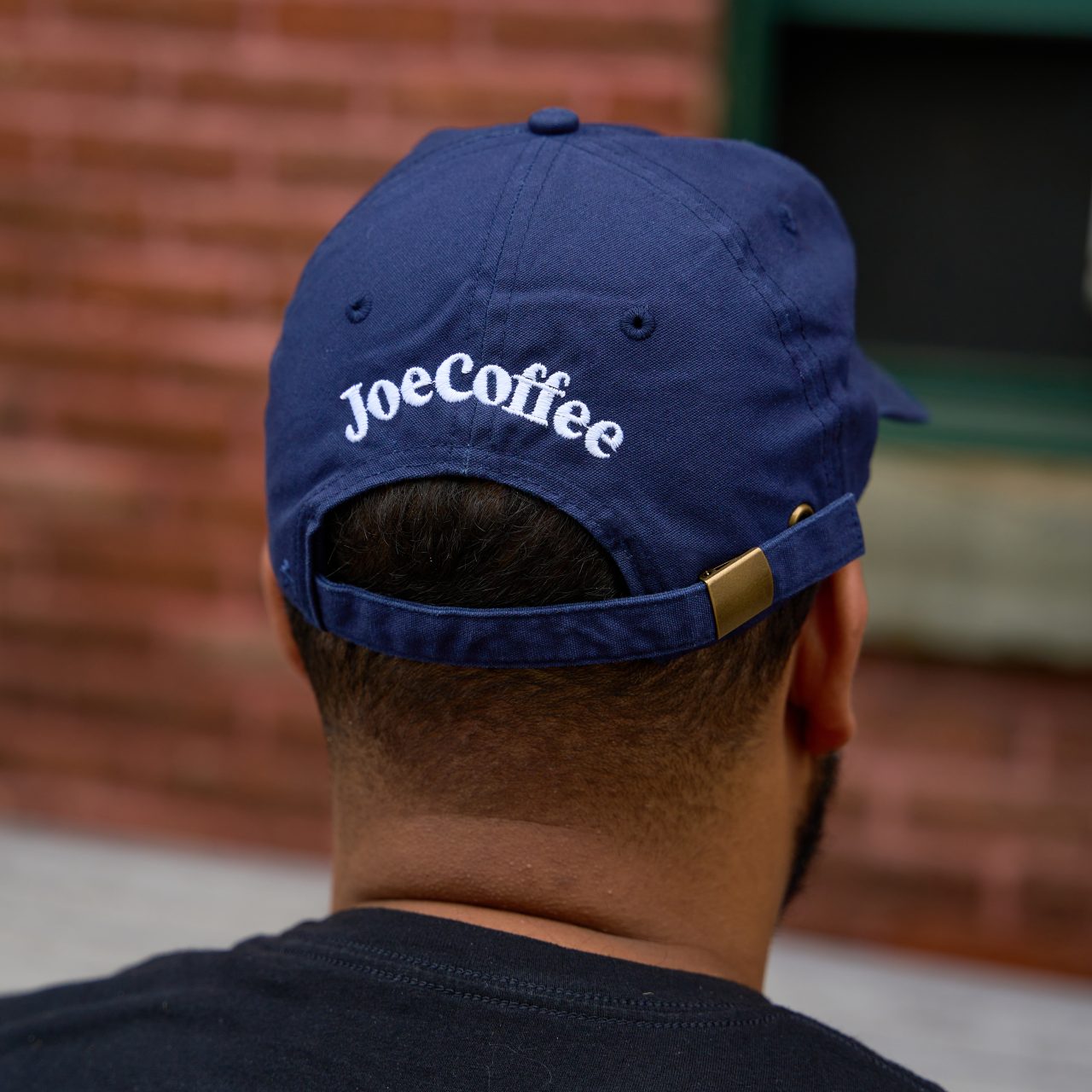 Navy blue backside dad hat with Joe Coffee Logo