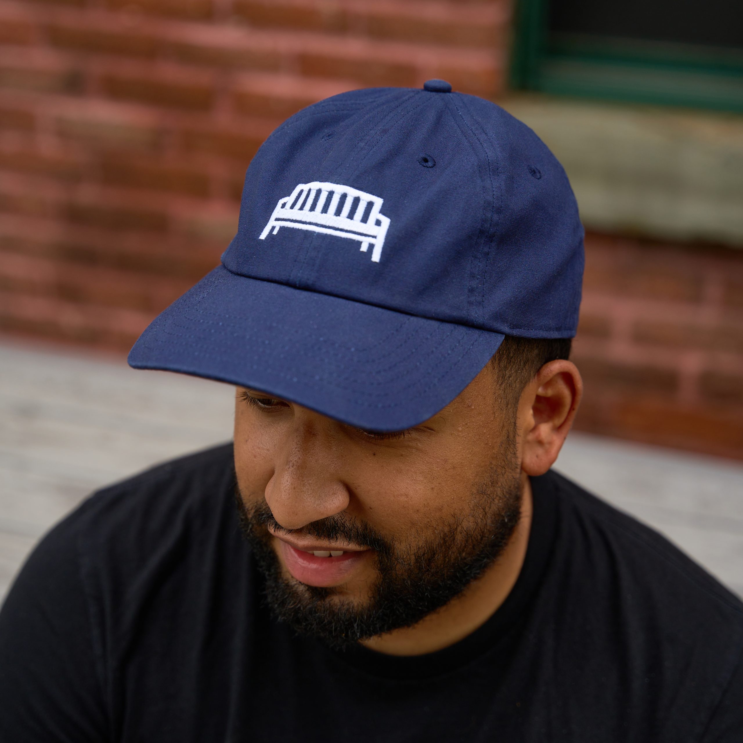 Navy blue frontside dad hat with bench